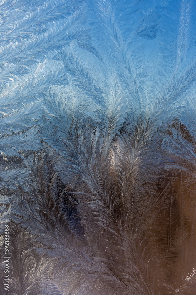 Frosty pattern on window glass Frosty pattern on window glass