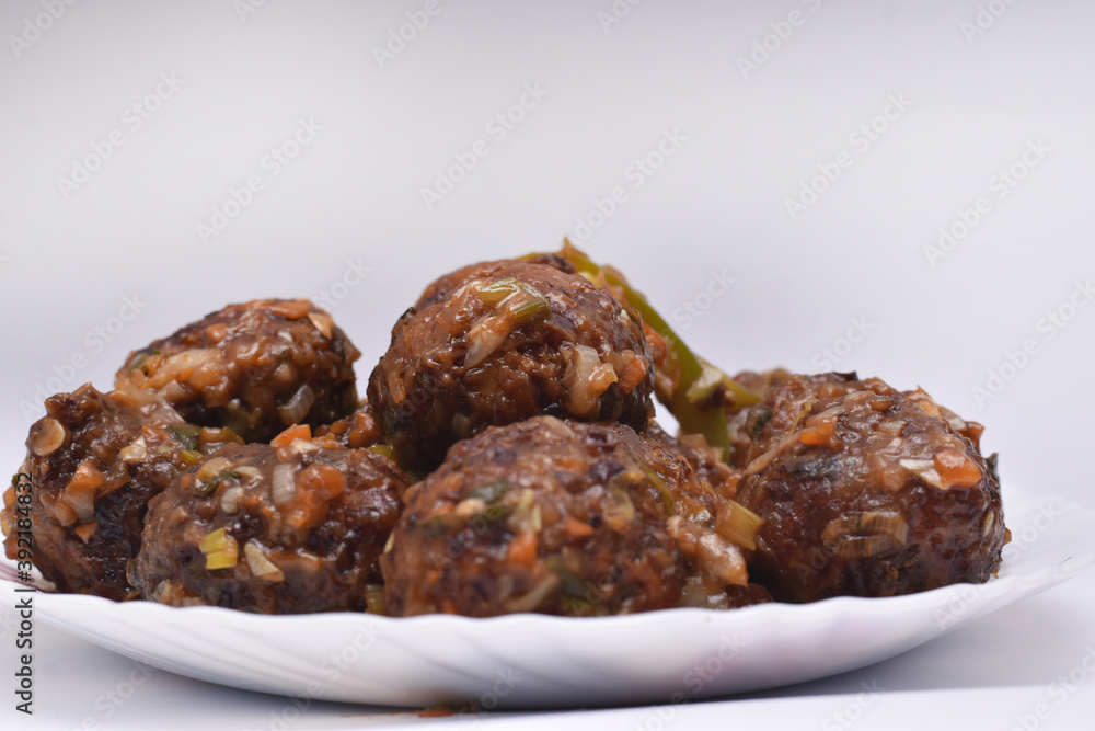 indian chinese, Gobi Manchurian dry - street food of India made of cauliflower and other vegetables