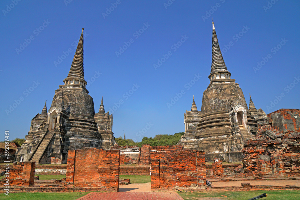 Sculpture of Three 3 Ancient old pagoda with the tourist at Wat Phra Si Sanphet is best Famous Landmark old History Buddhist temple in Ayutthaya , Thailand