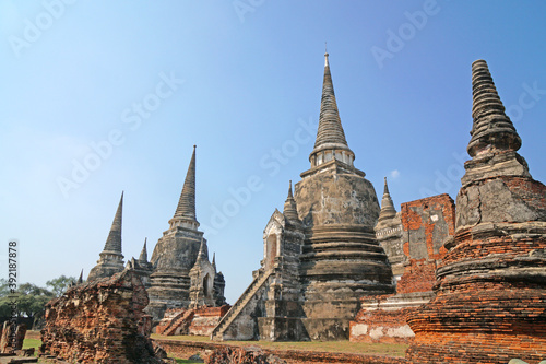 Sculpture of Three 3 Ancient old pagoda with the tourist at Wat Phra Si Sanphet is best Famous Landmark old History Buddhist temple in Ayutthaya , Thailand