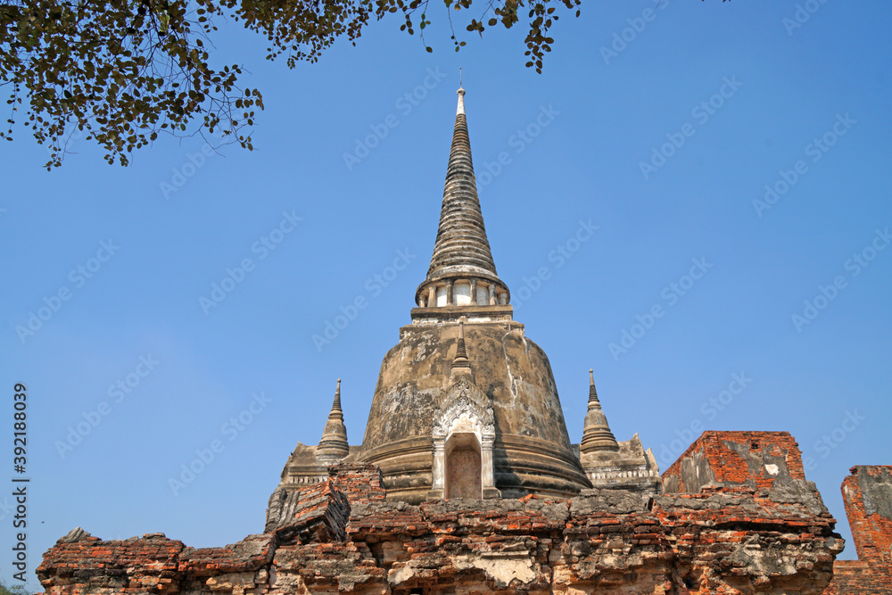 Sculpture of Three 3 Ancient old pagoda with the tourist at Wat Phra Si Sanphet is best Famous Landmark old History Buddhist temple in Ayutthaya , Thailand