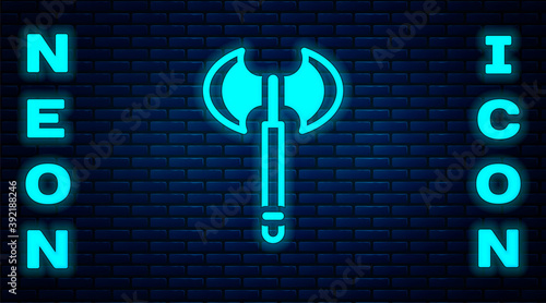 Glowing neon Medieval axe icon isolated on brick wall background. Battle axe, executioner axe. Medieval weapon. Vector.