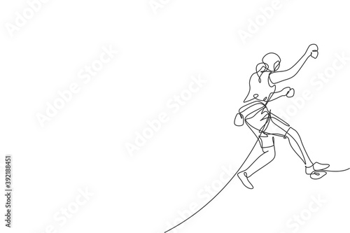One single line drawing young active woman climbing on cliff mountain holding safety rope vector graphic illustration. Extreme outdoor sport and bouldering concept. Modern continuous line draw design