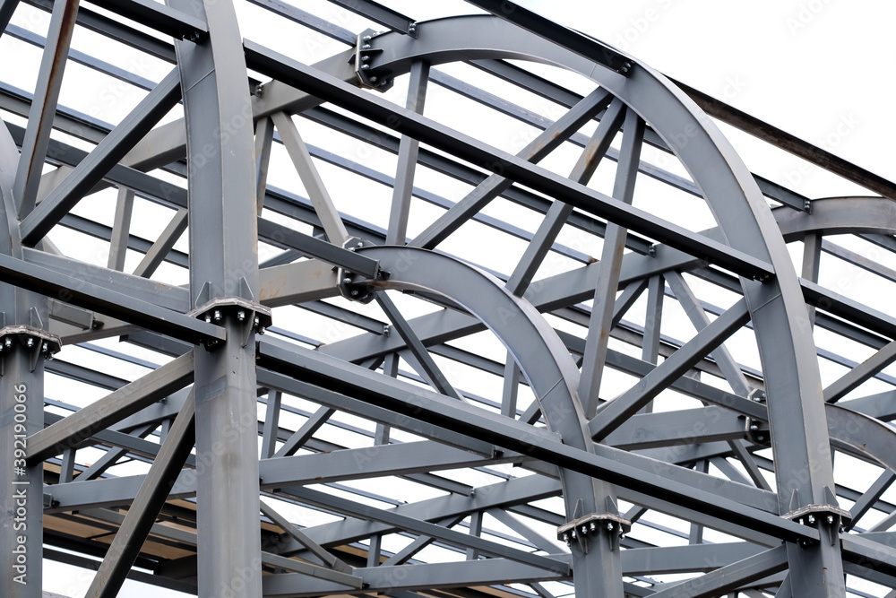 Row of stadium roof metal supports structure. Industrial steel background. Row of stadium roof metal supports structure. Industrial steel background.