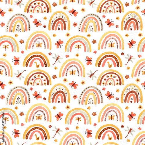 Watercolor seamless pattern with rainbows, flowers, butterflies on white. Perfect decoration for kids playroom, nursery, wallpapers, fabrics. Earth muted colors. Wrapping papers, covers, textile.