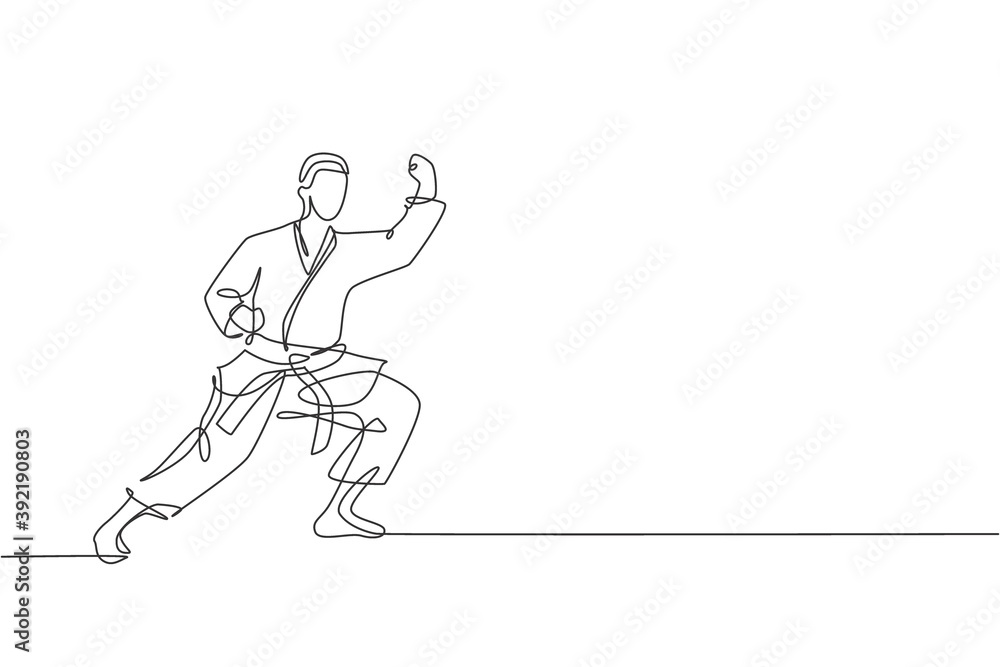 Single continuous line drawing of young confident karateka man in kimono practicing karate combat at dojo. Martial art sport training concept. Trendy one line draw design graphic vector illustration Single continuous line drawing of young confident karateka man in kimono practicing karate combat at dojo. Martial art sport training concept. Trendy one line draw design graphic vector illustration