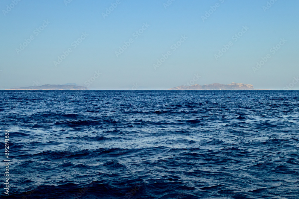 Seascape in Egadi Archipelago, Favignana and Levanzo visible on the Horizon line