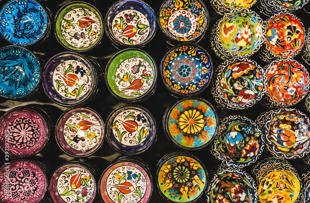 Souvenirs and gifts from Turkey. Ceramics, lamps and decor on a market counter in Istanbul. Souvenirs and gifts from Turkey. Ceramics, lamps and decor on a market counter in Istanbul.