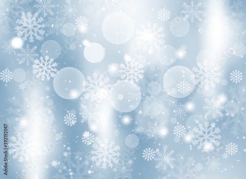 Blue abstract background. white light and snowflakes bokeh winter for Christmas new year blurred beautiful shiny lights use for card banner wallpaper backdrop and your product.