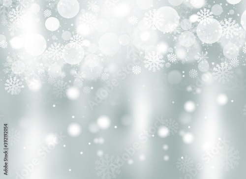 Gray abstract background. white light and snowflakes bokeh winter for Christmas new year blurred beautiful shiny lights use for card banner wallpaper backdrop and your product.