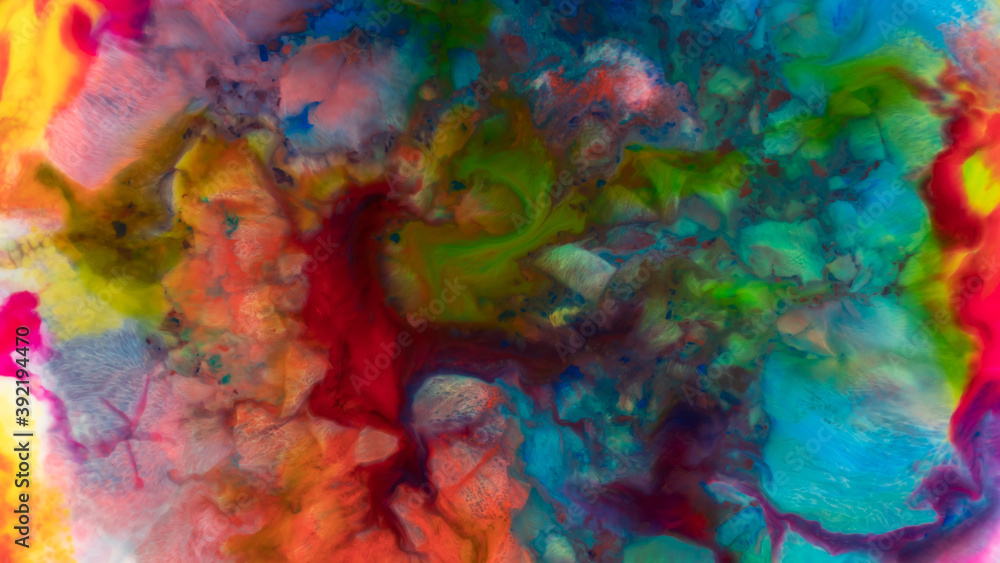 Abstract background of moving liquid paints close-up.