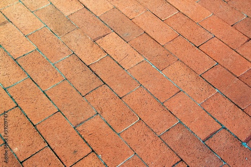 Pattern of pavement on street.