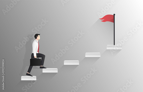 Businessman walking up the stair to red flag on top concept Fototapeta