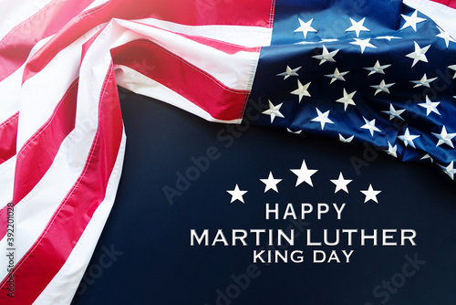 Martin Luther King Day Anniversary - American flag on blue background