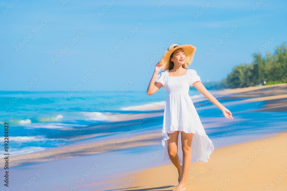 Portrait beautiful young asian woman relax smile leisure around sea beach ocean Portrait beautiful young asian woman relax smile leisure around sea beach ocean