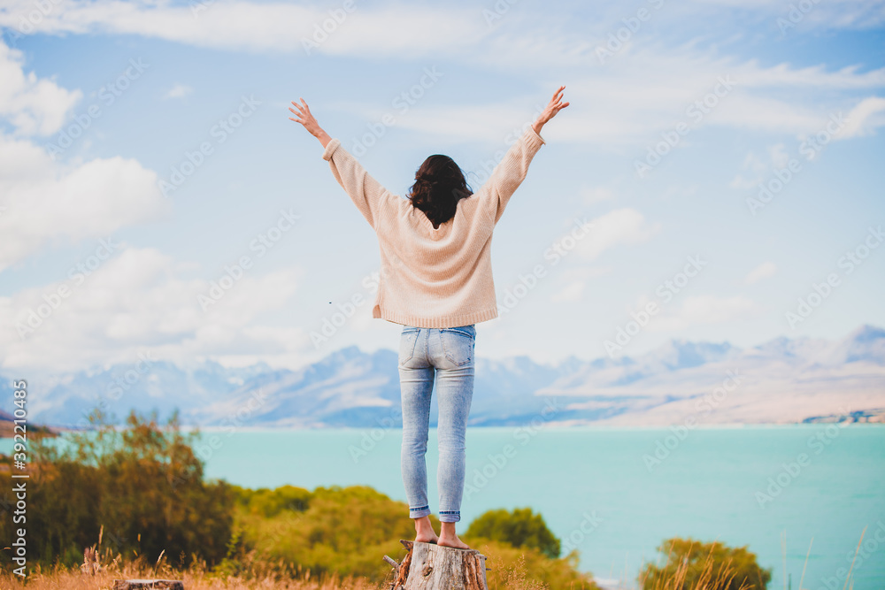 Fototapeta premium Happy woman with hands up
