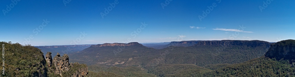 Beautiful panoramic view of deep valleys and tall mountains, Three Sisters Lookout, Blue Mountain National Park, New South Wales, Australia
