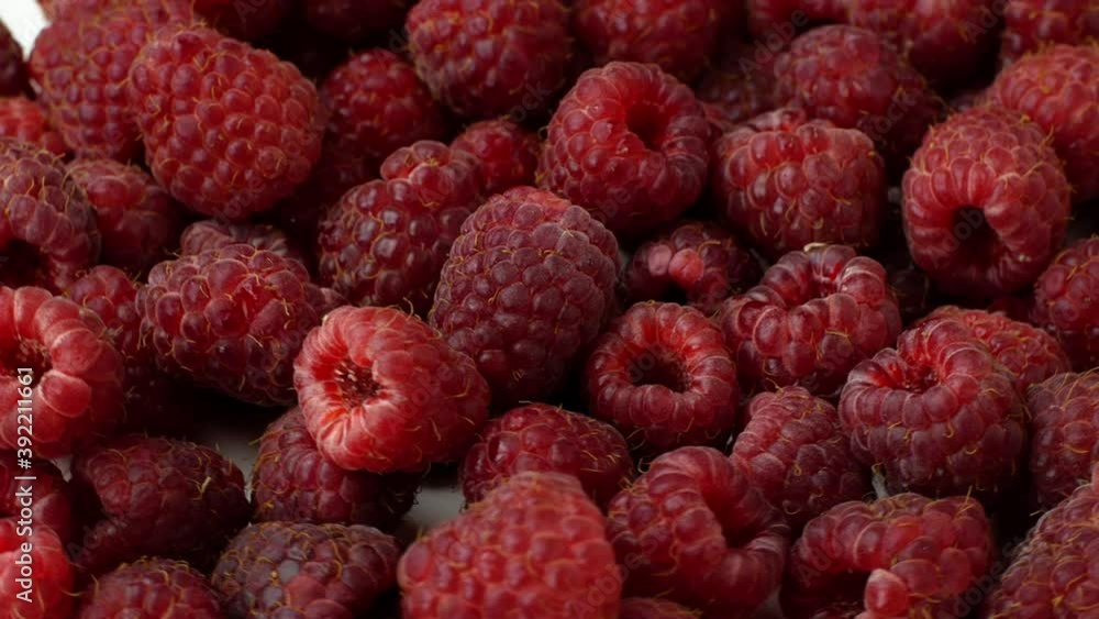 4K Beautiful ripe raspberry rotates on a plate. Slow rotation of raspberries close-up top view.
4K Beautiful ripe raspberry rotates on a plate. Slow rotation of raspberries close-up top view.