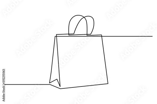 Shopping bag in continuous line art drawing style. Paper package minimalist black linear sketch isolated on white background. Vector illustration