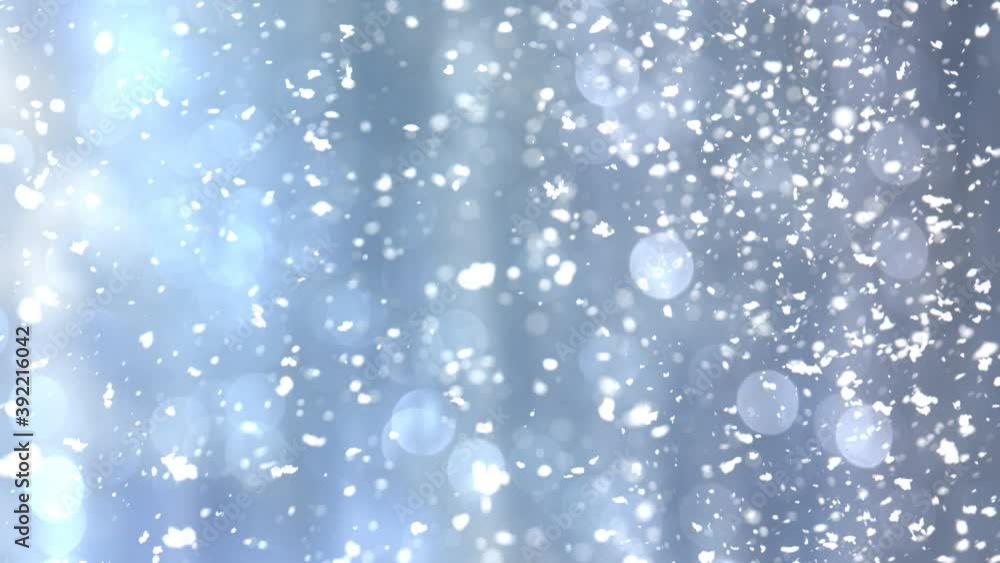 Super Slow Motion Shot of Real Snow Falling on Blue Christmas Background at 1000 fps. Super Slow Motion Shot of Real Snow Falling on Blue Christmas Background at 1000 fps.