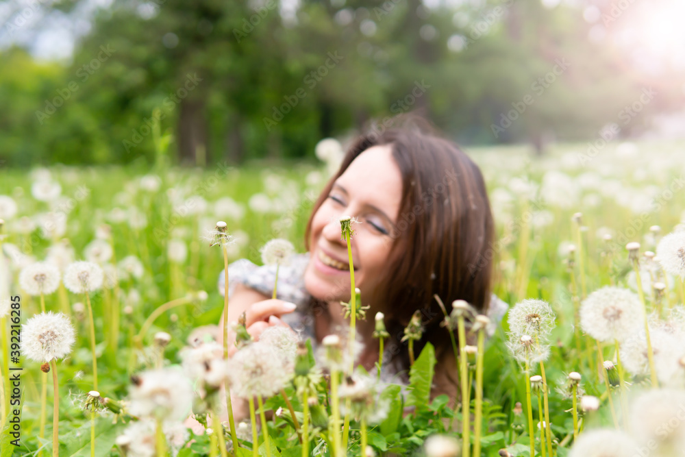 Beautiful woman in a summer Park in nature walking. Beautiful woman in a summer Park in nature walking.