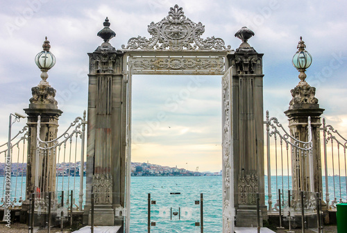 Dolmabahce Palace Gate leading to the Bosphorus Strait. Istanbul, Turkey photo
