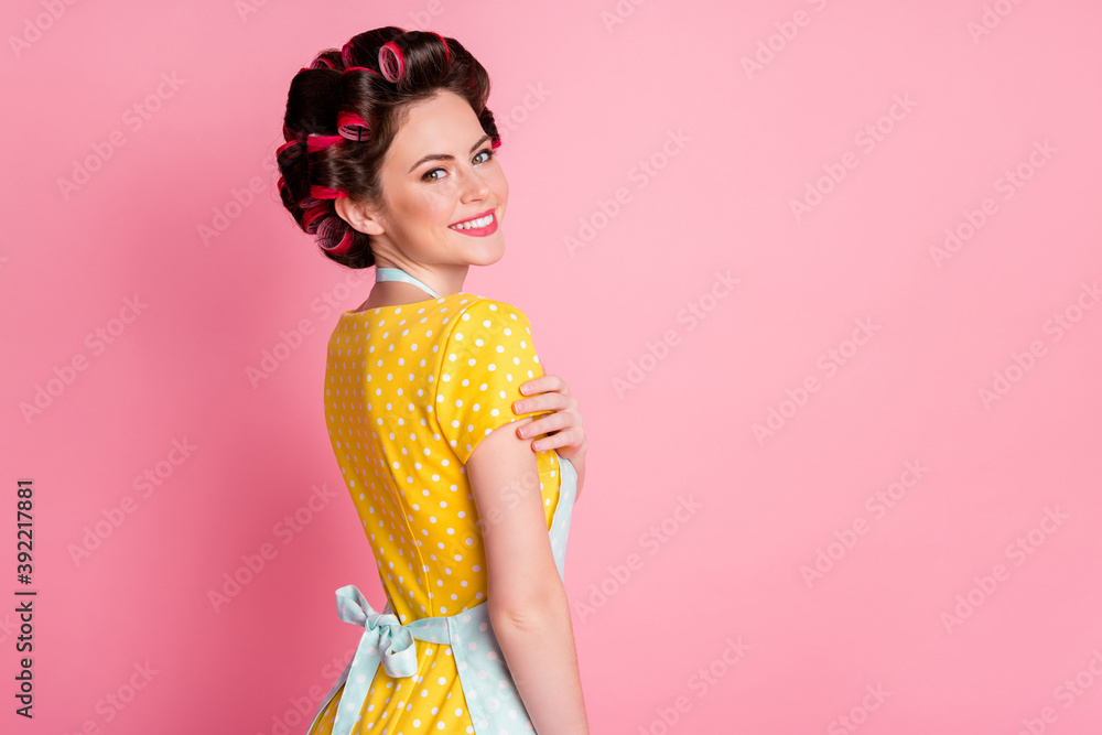 Back rear spine view photo of magnificent wife girl touch arm wear vintage style outfit isolated on pastel color background Back rear spine view photo of magnificent wife girl touch arm wear vintage style outfit isolated on pastel color background