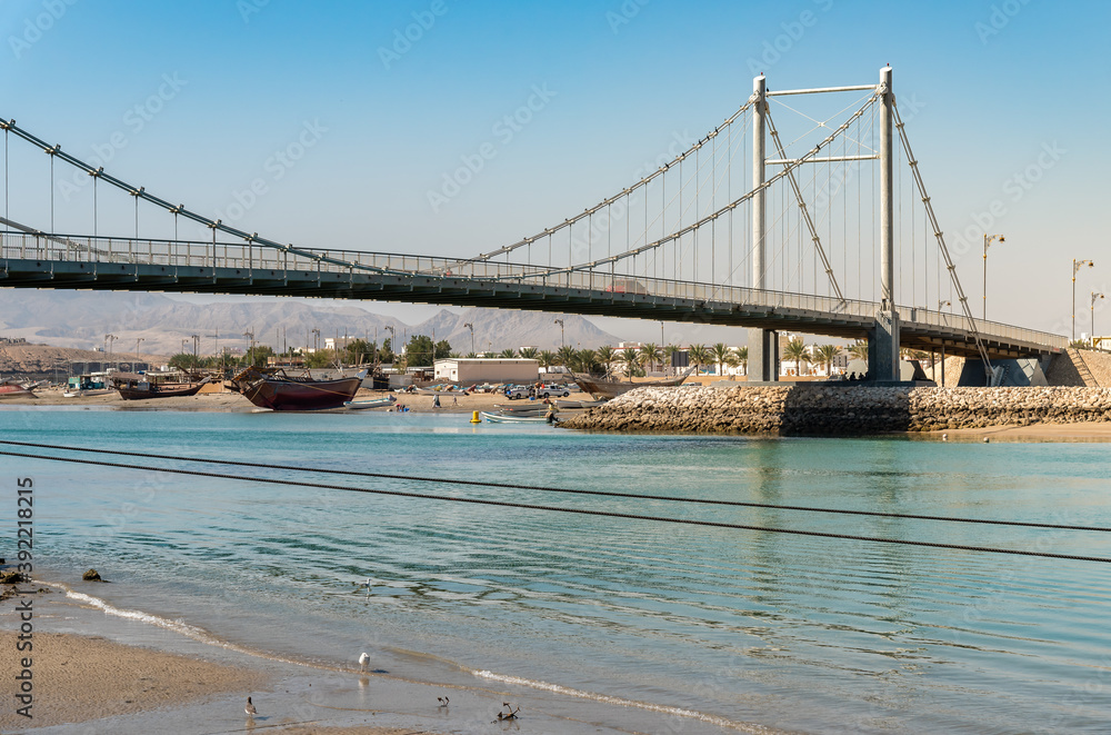 Naklejka premium View of Khor Al Batah suspension bridge in Sur, Sultanate of Oman