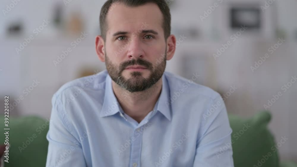 Close Up of Young Man Looking at Camera Close Up of Young Man Looking at Camera
