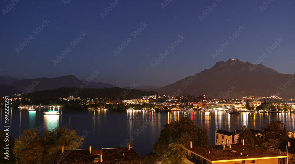 Night scene in Lucerne Switzerland,lake at night,with mountains in the background