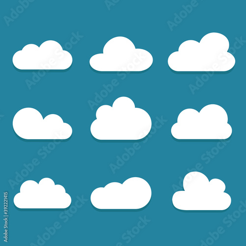 White cartoon clouds set isolated on blue background. Collection of different cartoon clouds for background template, wallpaper and sky design. Cartoon clouds vector. Sky illustration