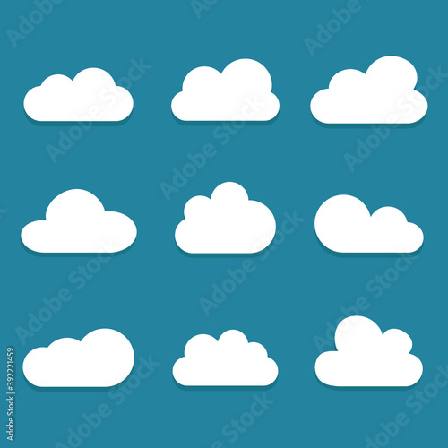 White cartoon clouds set isolated on blue background. Collection of different cartoon clouds for background template, wallpaper and sky design. Cartoon clouds vector. Sky illustration