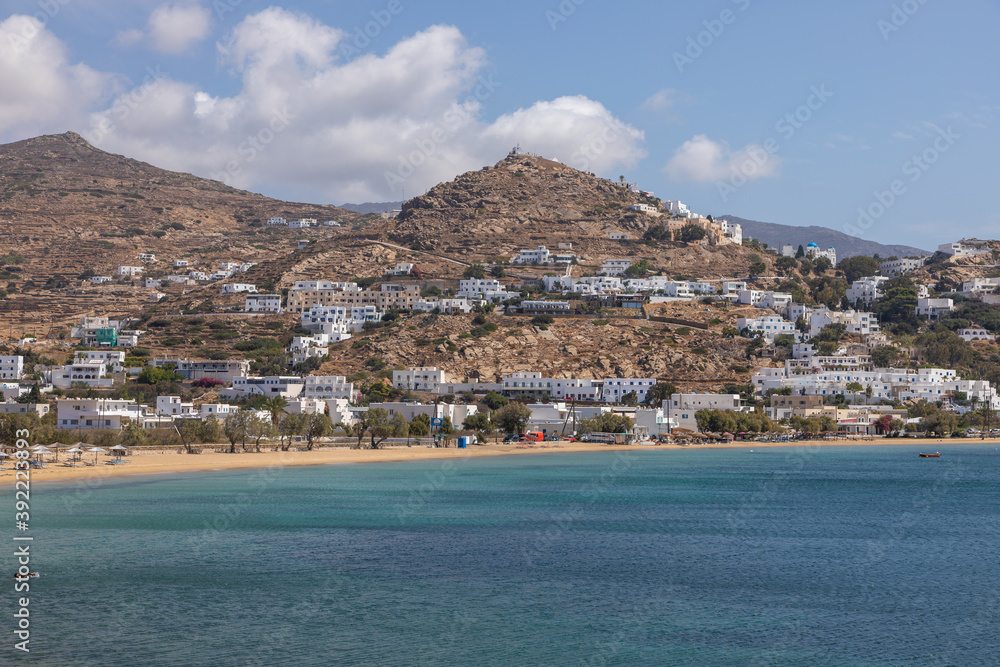 View of the traditional, white buildings in port, Ios, Greece.