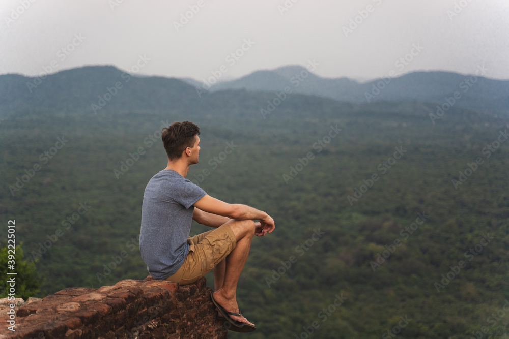 young adult observe panorama from lion rock in Sri Lanka