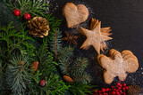  Christmas and New Year compositions on a black background, cones, spruce, gingerbread. Copy space, flat lay, top point