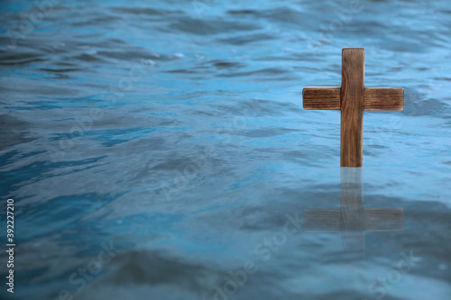 Fototapet Wooden cross in river for religious ritual known as baptism