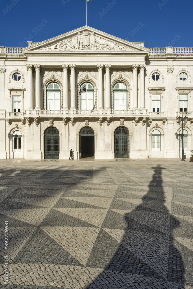 Lisbon City Hall with a square made of black and white basalt pavement in Lisbon
