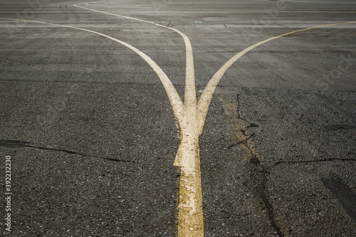 Marking the road at the airport. Three divergent line