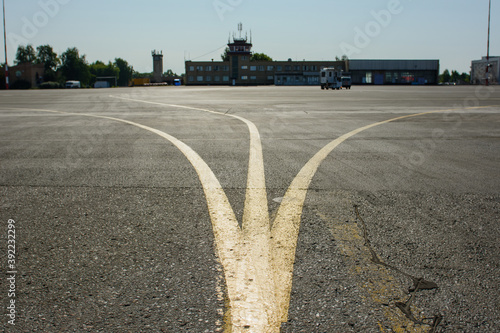 Fotografie Marking the road at the airport. Three divergent line