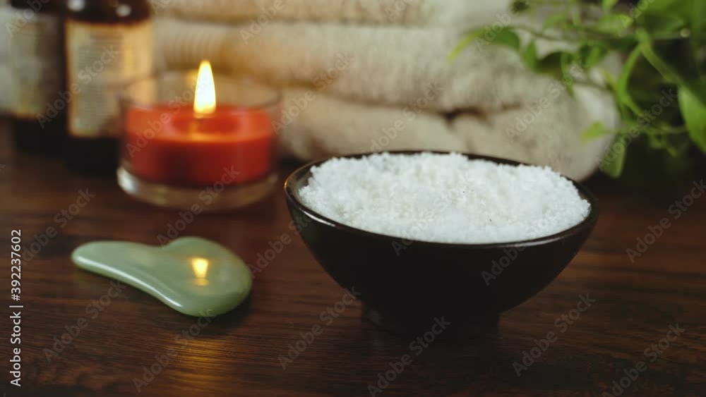 Massage master making salt scrub massage. Spa and massage concept. Massage master making salt scrub massage. Spa and massage concept.