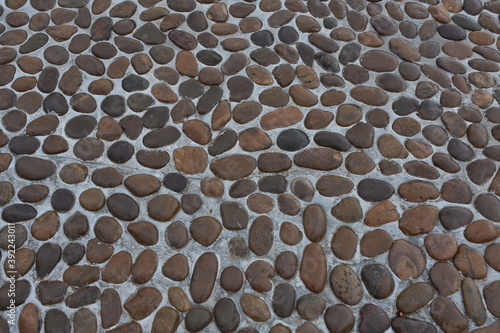 Background texture of pebble stone wall.
