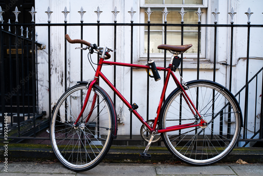 Red bicycle in the streets of London