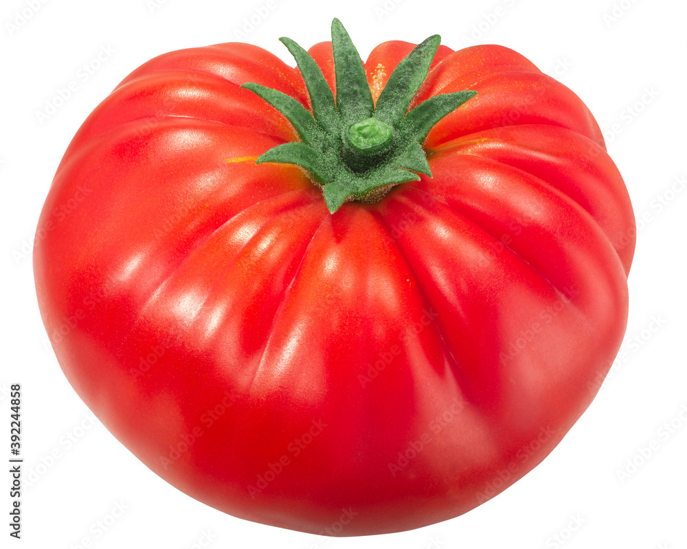 Ripe heirloom ribbed beefsteak tomato (Solanum lycopersicum fruit) isolated Ripe heirloom ribbed beefsteak tomato (Solanum lycopersicum fruit) isolated