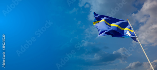 Beautiful national state flag of Nauru with blank space.