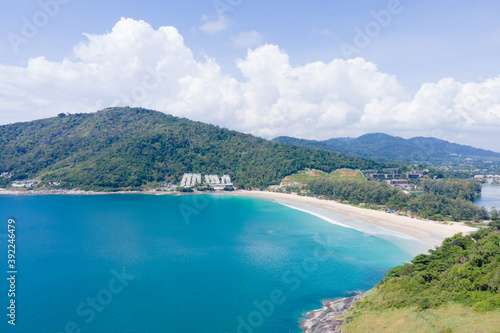 Phuket beach sea sand and sky. Aerial view of Landscape view of beach sea in summer day. Beach space area. At Karon Beach, Phuket, Thailand. On 15 November 2020. Nature and travel concept. © BUDDEE