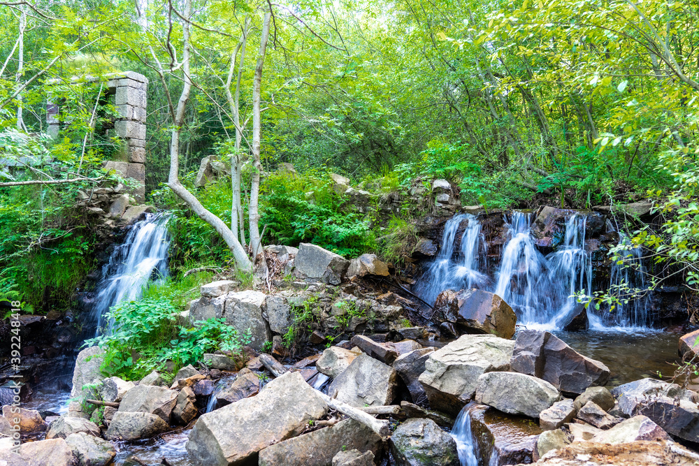 Fototapeta premium Long exposure waterfall in forest montseny mountain