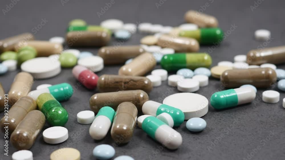 Many Various Pills, Vitamins, Medications On White Background. Panning Dolly Slider Shot. Many Various Pills, Vitamins, Medications On White Background. Panning Dolly Slider Shot.