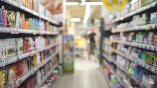 Wallpaper Mural Slow camera movement between two shelves with goods in a supermarket. Torontodigital.ca
