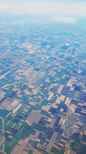 The view from the airplane window to the ground. Landscape view from the sky