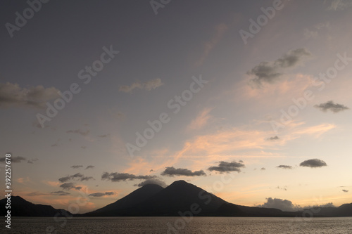 Guatemala  Central America  sunset at lake Atitl  n  Atitlan  with volcanos Atitlan and  Toliman